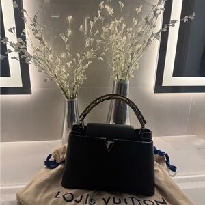 Authentic Louis Vuitton Capucines MM with Python Handle.